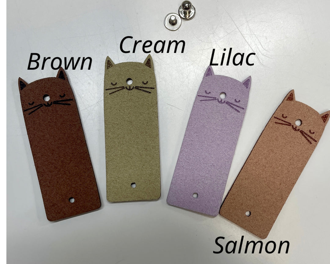 Tag avec rivet (Chat)