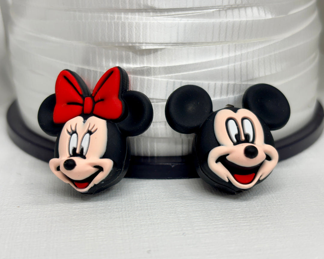 Protège pointe en silicone. Mickey mouse et Minnie Mouse