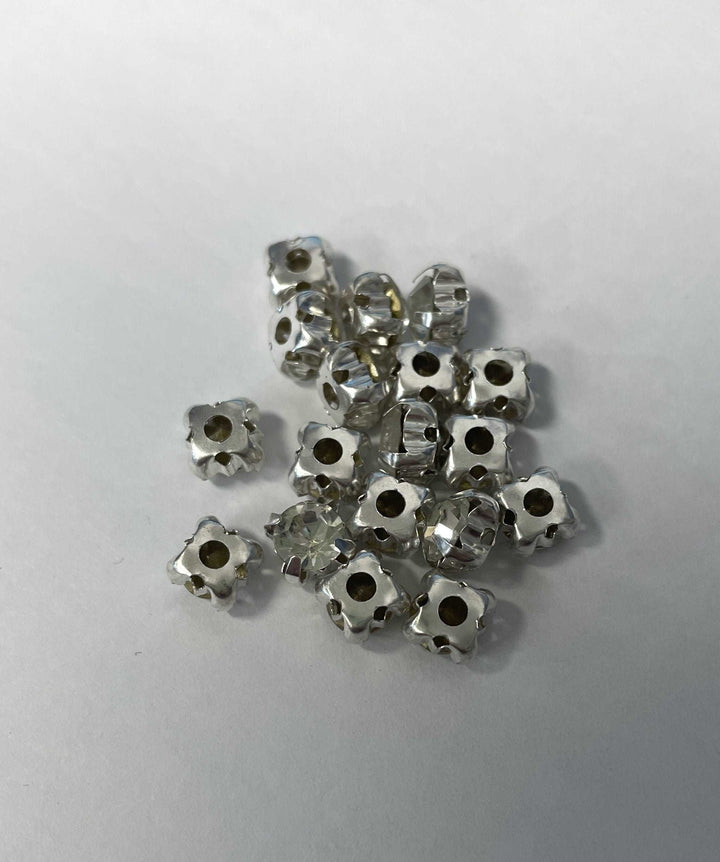 10 Strass acryliques à coudre.