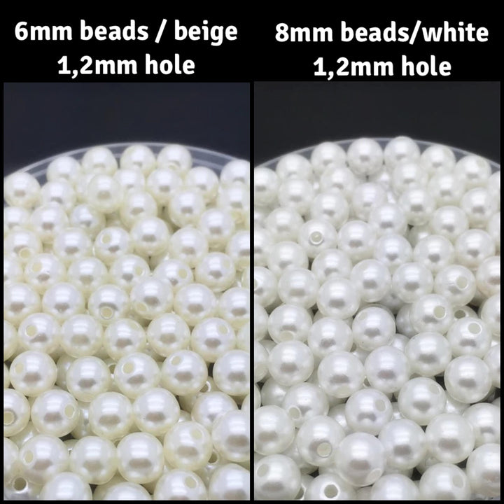 10 perles en acrylique à coudre.