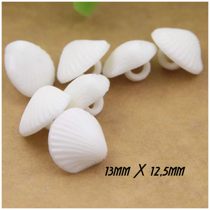 4 boutons en acrylique coquillage