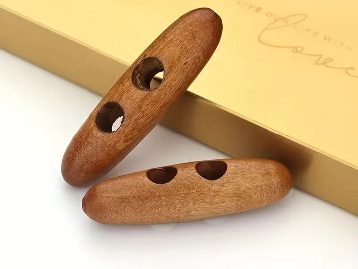 5 boutons en bois
